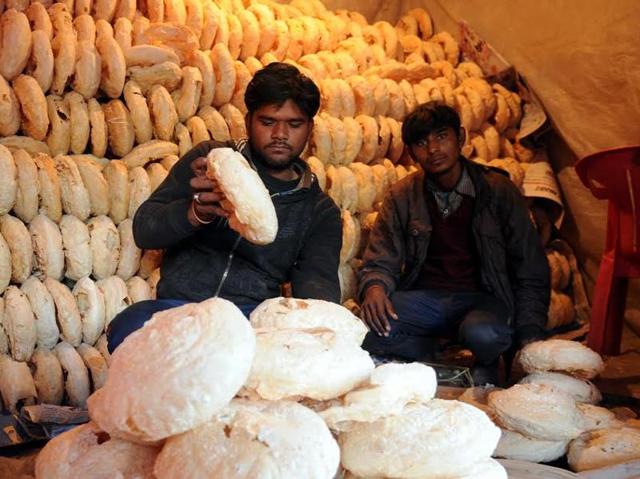 Men selling sweets at Fategarh Sahib on the occasion of the 311th Jor Mel on Saturday. (Bharat Bhushan/HT Photo)