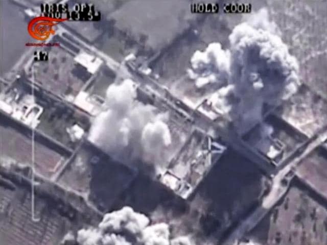 Drone footage allegedly showing Syrian army airstrikes targeting Zahran Allouch, the head of the Army of Islam group near Damascus, Syria.(AP) Drone footage allegedly showing Syrian army airstrikes targeting Zahran Allouch, the head of the Army of Islam group near Damascus, Syria.(AP)