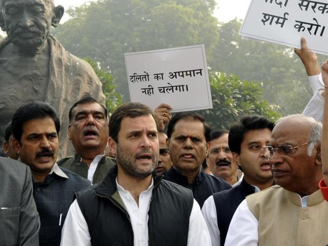 Congress MPs led by Rahul Gandhi staged dharna outside the Parliament house demanding removal of minister VK Singh for using “dog analogy” while commenting on Dalit deaths, in New Delhi, India, on Monday, December 7, 2015.(Hindustan Times)