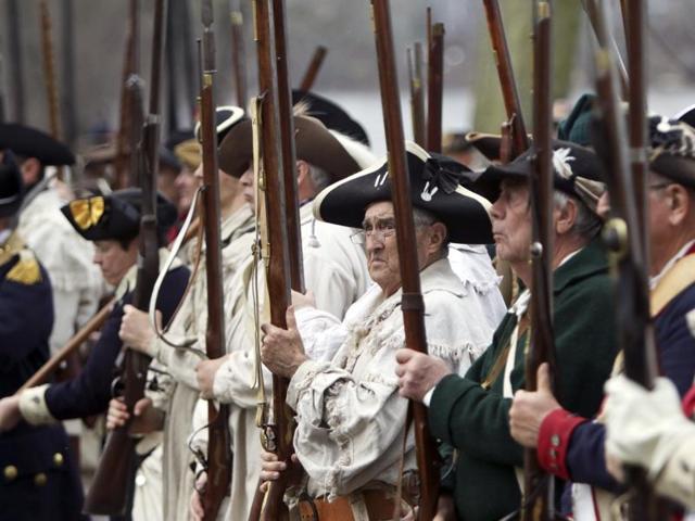 A group of Revolutionary War re-enactors wait to board Durham boats during the re-enactment of Washington crossing the Delaware River. (AP) A group of Revolutionary War re-enactors wait to board Durham boats during the re-enactment of Washington crossing the Delaware River. (AP)