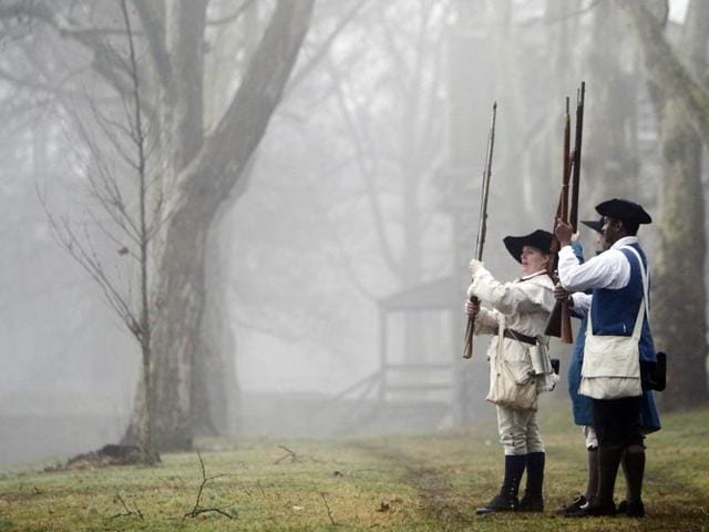 A group of Revolutionary War re-enactors drill before the re-enactment of Washington crossing the Delaware River. (AP) A group of Revolutionary War re-enactors drill before the re-enactment of Washington crossing the Delaware River. (AP)