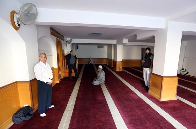 People, some praying, gather in a Muslim prayer room in Ajaccio, on the French Mediterranean island of Corsica. (AP) People, some praying, gather in a Muslim prayer room in Ajaccio, on the French Mediterranean island of Corsica. (AP)