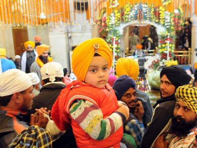 Devotees during the 311th Saheedi Jor Mela in Fatehgarh Sahib on Saturday.(Bharat Bhushan/HT Photo)