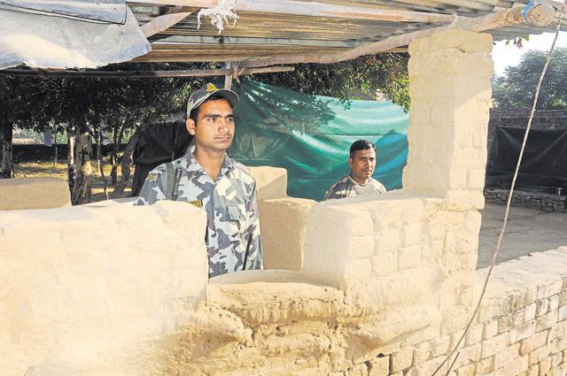 CRPF personnel guarding the post in village Mirchpur, Hisar. (HT Photo)