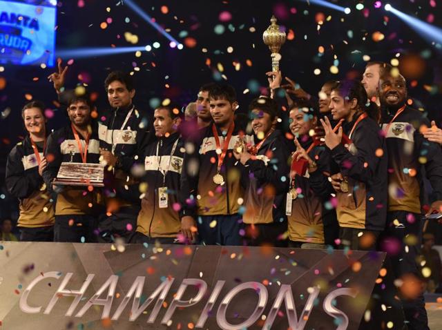Mumbai Garuda celebrates as they win the Pro Wrestling League after defeating Haryana Hammers in the final match, at IGI Stadium, in New Delhi. (HT Photo) Mumbai Garuda celebrates as they win the Pro Wrestling League after defeating Haryana Hammers in the final match, at IGI Stadium, in New Delhi. (HT Photo)