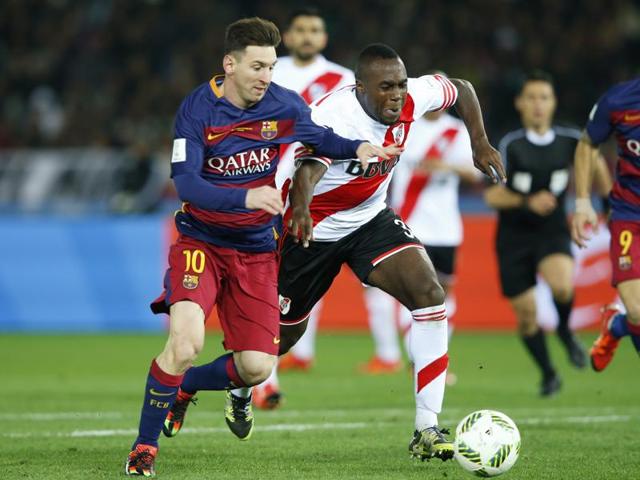 FC Barcelona’s Lionel Messi fights for the ball with River Plate’s Gabriel Mercado during their final match at the FIFA Club World Cup soccer tournament in Yokohama, near Tokyo. (AP Photo) FC Barcelona’s Lionel Messi fights for the ball with River Plate’s Gabriel Mercado during their final match at the FIFA Club World Cup soccer tournament in Yokohama, near Tokyo. (AP Photo)