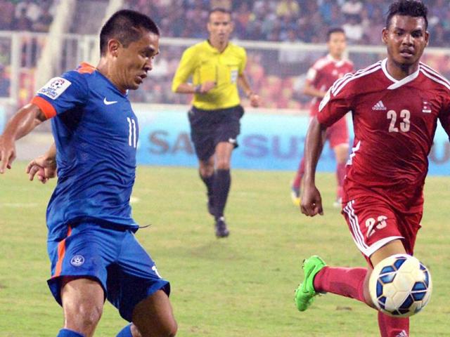 Indian and Nepal's players in action during their SAFF Suzuki Cup 2015 match in Thiruvananthapuram.(PTI Photo) Indian and Nepal's players in action during their SAFF Suzuki Cup 2015 match in Thiruvananthapuram.(PTI Photo)