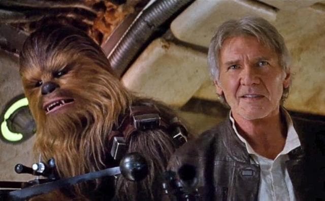 Harrison Ford’s Han Solo with Chewie in the film. (Disney)