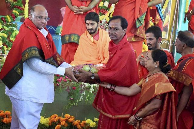 National Congress Party (NCP) chief Sharad Pawar with Telangana chief minister K Chandrashekar Rao during Ayutha Chandi Maha Yagam in Medak district on Sunday. (PTI)