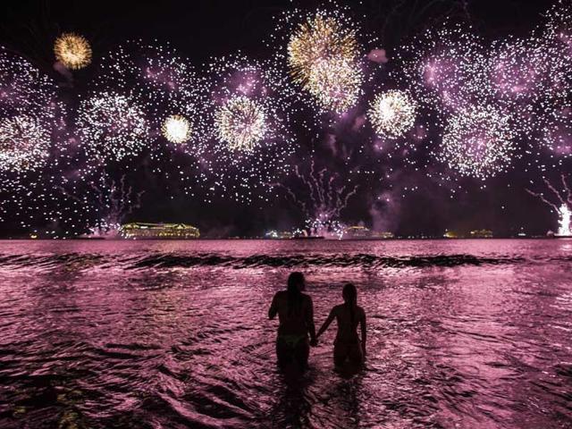 New Year celebrations for Delhiites might a more quieter affair than usual because of a HC injunction that prevents venues from playing copyright music. (AP Photo) New Year celebrations for Delhiites might a more quieter affair than usual because of a HC injunction that prevents venues from playing copyright music. (AP Photo)