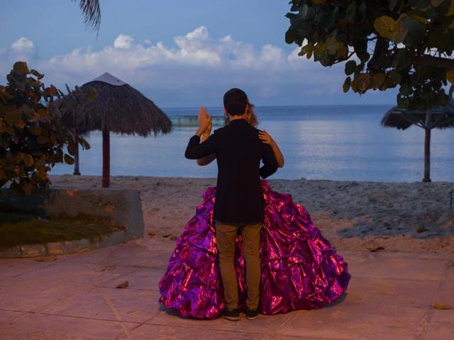 Amanda Teresa Betancur, 15, who lives in Cuba, practices her opening dance with her boyfriend Erick before her quinceanera party in Havana, Cuba on December 13, 2015. (AP) Amanda Teresa Betancur, 15, who lives in Cuba, practices her opening dance with her boyfriend Erick before her quinceanera party in Havana, Cuba on December 13, 2015. (AP)
