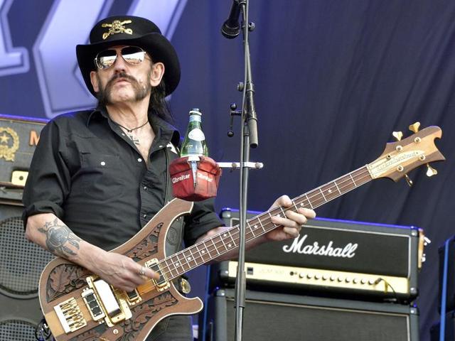 This file photo taken on June 19, 2015 shows Motorhead's singer and bassist, Ian Lemmy Kilmister, performing during the Hellfest heavy metal and hard rock music festival Hellfest in Clisson, near Nantes, western France. Ian Lemmy Kilmister, the frontman of iconic British heavy metal band Motorhead, has died aged 70 of a sudden, aggressive cancer, the group said on December 29, 2015. (AFP)