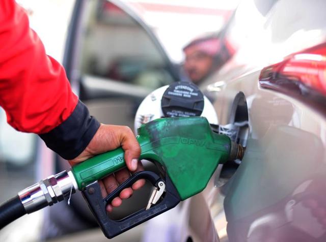 A Saudi employee fills the tank of his car with petrol at a station on Monday in the Red Sea city of Jeddah. The Saudi council of ministers decided to raise the price of higher-grade unleaded petrol to 0.90 riyals ($0.24) per litre from 0.60 riyals, a hike of 50%, and for lower-grade petrol to 0.75 riyals ($0.20) from 0.45 riyals per litre, a 67% rise. (AFP) A Saudi employee fills the tank of his car with petrol at a station on Monday in the Red Sea city of Jeddah. The Saudi council of ministers decided to raise the price of higher-grade unleaded petrol to 0.90 riyals ($0.24) per litre from 0.60 riyals, a hike of 50%, and for lower-grade petrol to 0.75 riyals ($0.20) from 0.45 riyals per litre, a 67% rise. (AFP)