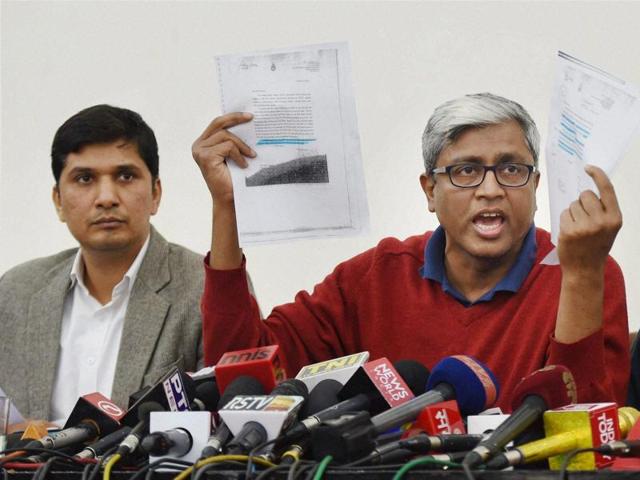 AAP leaders Ashutosh, Saurabh Bhardwaj and Dilip Pandey showing documents during a press conference in New Delhi on Wednesday. (PTI Photo) AAP leaders Ashutosh, Saurabh Bhardwaj and Dilip Pandey showing documents during a press conference in New Delhi on Wednesday. (PTI Photo)