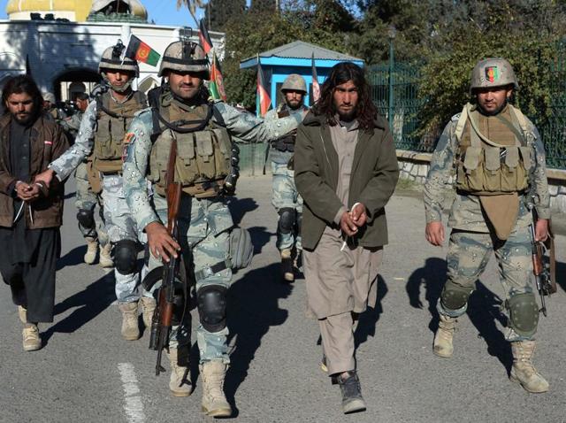 Alleged Taliban militants are presented to the media in Jalalabad, Nangarhar province on December 29, 2015. Afghan border police said they arrested nine alleged Taliban militants with their weapons during clashes in the Nazyan district of Nangarhar province. (AFP) Alleged Taliban militants are presented to the media in Jalalabad, Nangarhar province on December 29, 2015. Afghan border police said they arrested nine alleged Taliban militants with their weapons during clashes in the Nazyan district of Nangarhar province. (AFP)