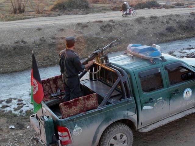 Afghan police patrol in Lashkar Gah, capital of Helmand province, Afghanistan. The AQIS camp, described by military officials as one of the largest ever discovered, was attacked by American and Afghan commandos in October, backed by several US airstrikes. (AP) Afghan police patrol in Lashkar Gah, capital of Helmand province, Afghanistan. The AQIS camp, described by military officials as one of the largest ever discovered, was attacked by American and Afghan commandos in October, backed by several US airstrikes. (AP)