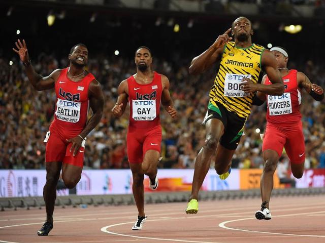King of Beijing: Usain Bolt celebrates winning the final of the men’s 100 metres before (L-R) USA's Justin Gatlin, USA's Tyson Gay and USA's Mike Rodgers. Bolt also went on to win the 200m final and the 4x100m relay. (AFP Photo) 