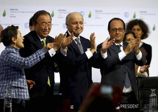 (From right to left) French President Francois Hollande, French foreign minister and president of the COP21 Laurent Fabius, United Nations Secretary General Ban ki-Moon and UN climate chief Christiana Figueres applaud after the final conference at the COP21, United Nations conference on climate change in Le Bourget near Paris on December 12, 2015. (AP) (From right to left) French President Francois Hollande, French foreign minister and president of the COP21 Laurent Fabius, United Nations Secretary General Ban ki-Moon and UN climate chief Christiana Figueres applaud after the final conference at the COP21, United Nations conference on climate change in Le Bourget near Paris on December 12, 2015. (AP)