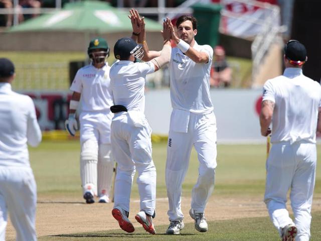 England's bowler Stuart Broad celebrates after dismissing South African batsman Morne Morkel during the day five of the first Test match between England and South Africa at Kingsmead stadium.(AFP Photo)