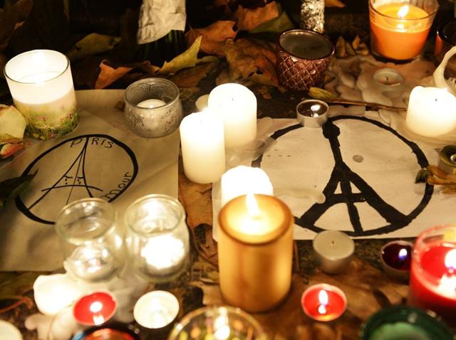 Nine months after the Charlie Hebdo attacks, Paris faced a deadly attack by armed militants killing nearly 129 people. Prayers poured in from all over the world as the attack left a stain of terrorism on 2015. (AFP) Nine months after the Charlie Hebdo attacks, Paris faced a deadly attack by armed militants killing nearly 129 people. Prayers poured in from all over the world as the attack left a stain of terrorism on 2015. (AFP)