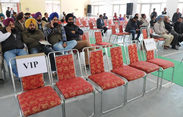 Bidders participating in the auction at the Sector-70 community centre in SAS Nagar on Tuesday.