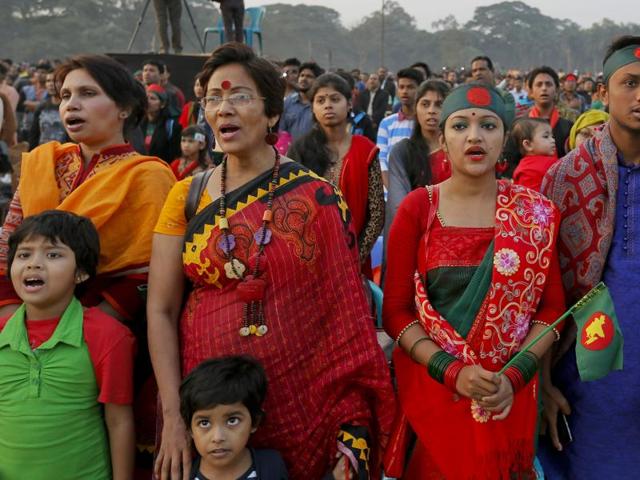 Bangladeshi people sing their national anthem as they mark the moment when the Pakistan army surrendered at this place on this day in 1971, in Dhaka, Bangladesh(AP) Bangladeshi people sing their national anthem as they mark the moment when the Pakistan army surrendered at this place on this day in 1971, in Dhaka, Bangladesh(AP)