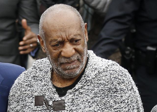 Bill Cosby arrives at court to face a felony charge of aggravated indecent assault Wednesday, Dec. 30, 2015, in Elkins Park, Pa. Cosby was charged Wednesday with drugging and sexually assaulting a woman at his home 12 years ago. (AP)