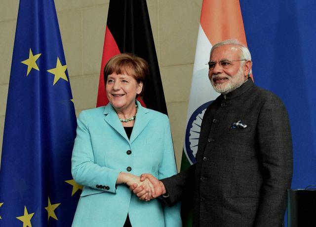 Prime Minister Narendra Modi shakes hands with German Chancellor Angela Merkel after their joint statement in Berlin, Germany on Tuesday. (PTI) Prime Minister Narendra Modi shakes hands with German Chancellor Angela Merkel after their joint statement in Berlin, Germany on Tuesday. (PTI)