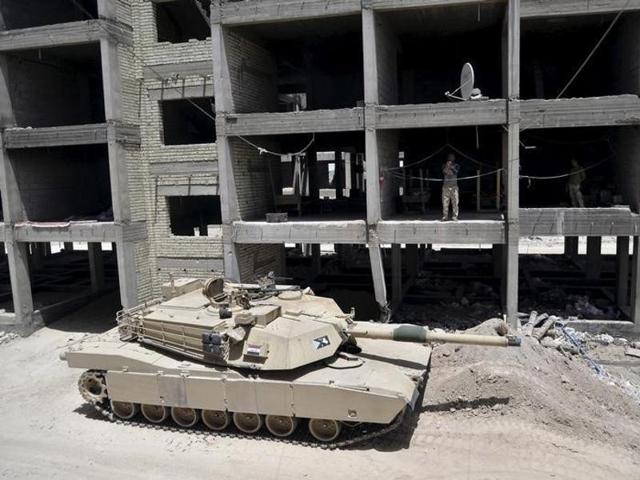 A tank of the Iraqi army is seen on the outskirts of the city of Falluja. A tank of the Iraqi army is seen on the outskirts of the city of Falluja.