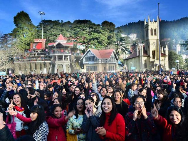 People in jovial mood at Ridge, Shimla on Thursday. (HT Photo )