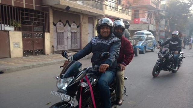 AAP minister Kapil Mishra on way to his office on a bike. (Kapil Mishra’s Twitter account) AAP minister Kapil Mishra on way to his office on a bike. (Kapil Mishra’s Twitter account)