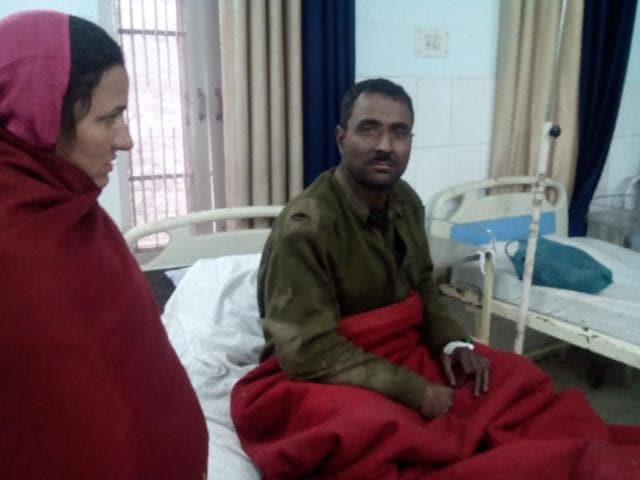 Labourer being treated in a local hospital in Jammu. (HT Photo) Labourer being treated in a local hospital in Jammu. (HT Photo)