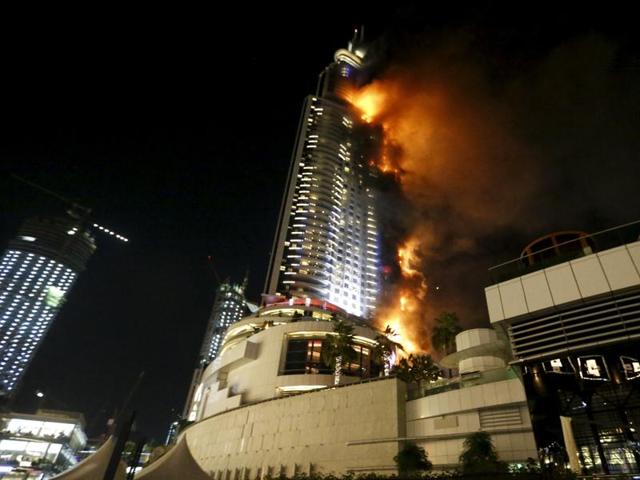 The Address Downtown hotel, which is a few blocks from the iconic Burj Khalifa, the world’s tallest tower, was engulfed in flames across several floors as sirens wailed and helicopters hovered overhead. (REUTERS) 