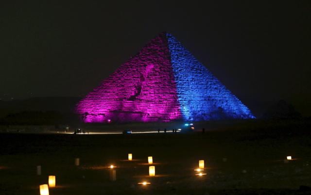At the Giza Pyramids, hundreds of people gathered for a fireworks and lighting display at the stroke of midnight. (REUTERS) At the Giza Pyramids, hundreds of people gathered for a fireworks and lighting display at the stroke of midnight. (REUTERS)
