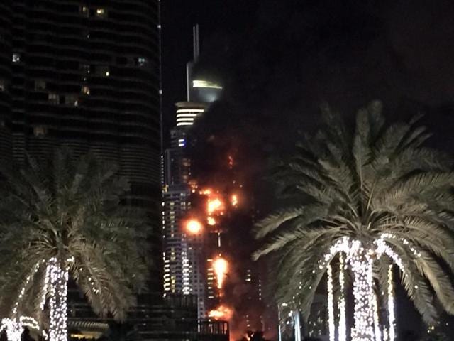 Dubai’s police chief said all the residents of the five star hotel had been evacuated from the scene of the blaze, which had still not been extinguished some three hours after it broke out. (AP) 