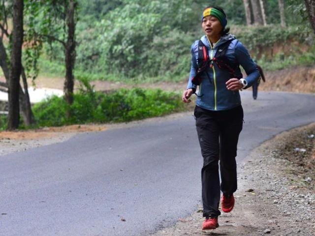 December 15, 2015, Nepalese ultra runner Mira Rai gestures as she speaks before a training session in the hills surrounding Kathmandu, on December 15, 2015.(AFP Photo) December 15, 2015, Nepalese ultra runner Mira Rai gestures as she speaks before a training session in the hills surrounding Kathmandu, on December 15, 2015.(AFP Photo)