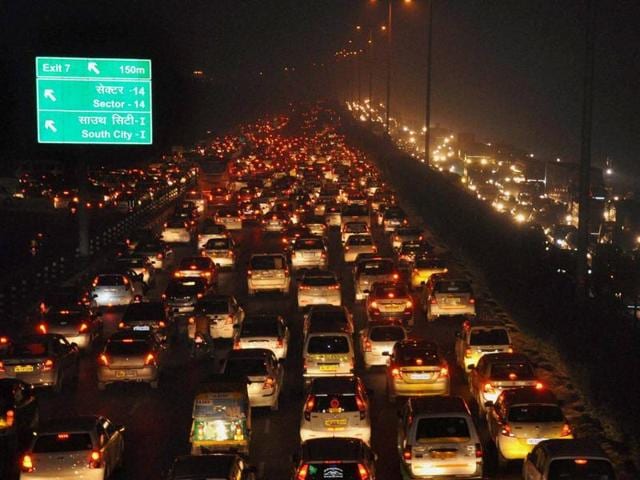 Heavy traffic jam on Delhi Gurgaon expressway during the New Year celebrations, in Gurgaon on Thursday night. (PTI) Heavy traffic jam on Delhi Gurgaon expressway during the New Year celebrations, in Gurgaon on Thursday night. (PTI)