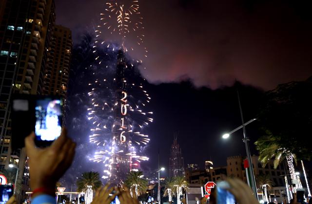 Fireworks illuminate the Burj Khalifa as the Hotel Address Downtown burns behind it. (AFP) Fireworks illuminate the Burj Khalifa as the Hotel Address Downtown burns behind it. (AFP)