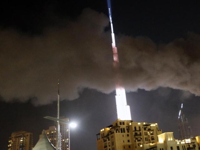 People were gathering to watch New Year's Eve celebrations when the hotel caught on fire without causing casualties, according to authorities.  (AFP) 