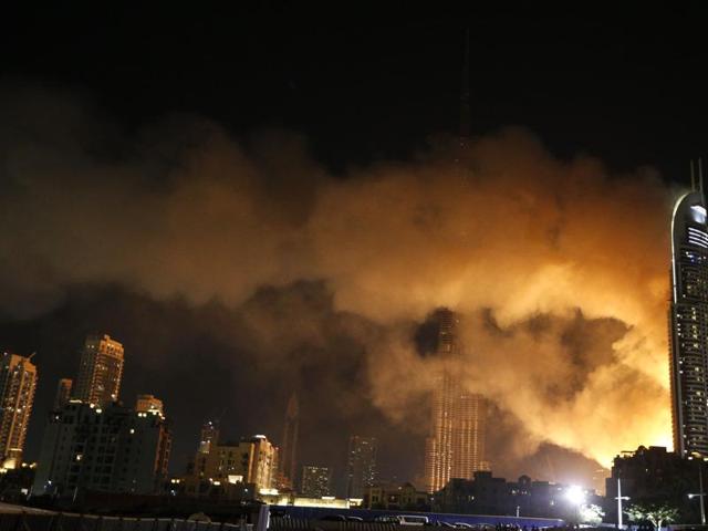 Witness Raphael Slama told AFP the fire started at around 9.30pm (1730 GMT) and rapidly spread upwards across dozens of floors. (AFP) 