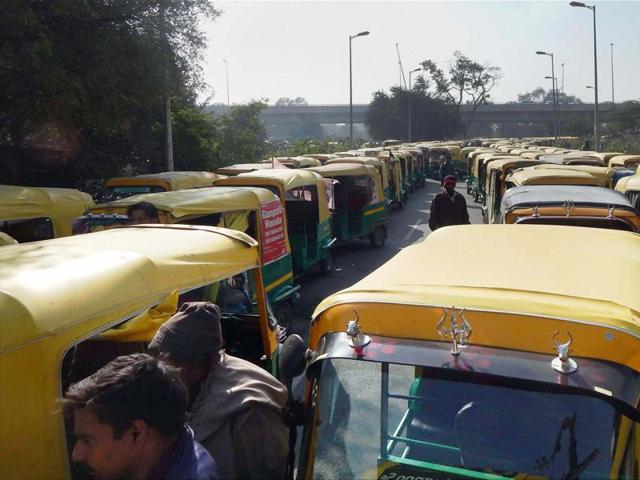 Auto-rickshaw drivers holding a protest against the misbehavior of police during Car Free Day in Gurgaon on Tuesday. (PTI) Auto-rickshaw drivers holding a protest against the misbehavior of police during Car Free Day in Gurgaon on Tuesday. (PTI)