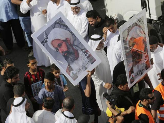 In this file photo taken on May 30, 2015, Saudis carry a poster demanding freedom for jailed Shia cleric Sheikh Nimr al-Nimr in Tarut, Saudi Arabia. Saudi Arabia says it has executed 47 prisoners, including leading Shia cleric Sheikh Nimr al-Nimr. (AP File Photo) In this file photo taken on May 30, 2015, Saudis carry a poster demanding freedom for jailed Shia cleric Sheikh Nimr al-Nimr in Tarut, Saudi Arabia. Saudi Arabia says it has executed 47 prisoners, including leading Shia cleric Sheikh Nimr al-Nimr. (AP File Photo)