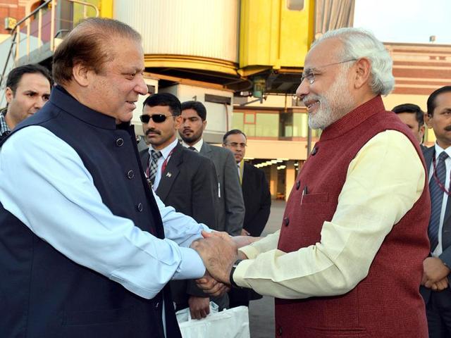 In this photograph released by the Press Information Bureau (PIB) on December 25, 2015, Prime Minister Narendra Modi (R) shakes hands with Pakistan Prime Minister Nawaz Sharif during the former’s surprise visit to Lahore.(AFP)