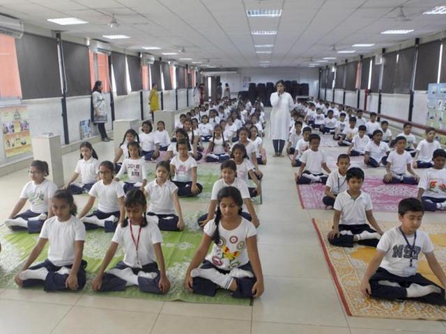 With the plan, the UGC is hoping to cash in on Prime Minister Narendra Modi’s push for yoga and its growing popularity across the world.(Ajay Aggarwal/HT Photo)