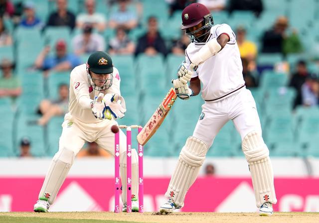 West Indies batsman Kraigg Brathwaite cuts a ball away as Australian wicketkeeper Peter Nevill watches during the first day of the third cricket Test match in Sydney. (AFP Photo) West Indies batsman Kraigg Brathwaite cuts a ball away as Australian wicketkeeper Peter Nevill watches during the first day of the third cricket Test match in Sydney. (AFP Photo)