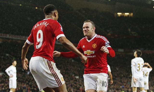 Wayne Rooney celebrates with Anthony Martial after scoring the second goal for Manchester United. (Reuters Photo) Wayne Rooney celebrates with Anthony Martial after scoring the second goal for Manchester United. (Reuters Photo)