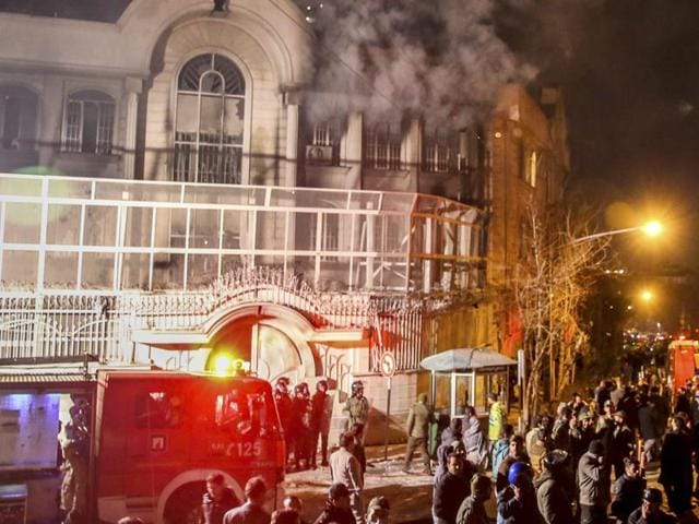 Smoke rises as Iranian protesters set fire to the Saudi embassy in Tehran. Protesters upset over the execution of a Shia cleric in Saudi Arabia set fire to the Saudi embassy in Tehran. (AP) Smoke rises as Iranian protesters set fire to the Saudi embassy in Tehran. Protesters upset over the execution of a Shia cleric in Saudi Arabia set fire to the Saudi embassy in Tehran. (AP)