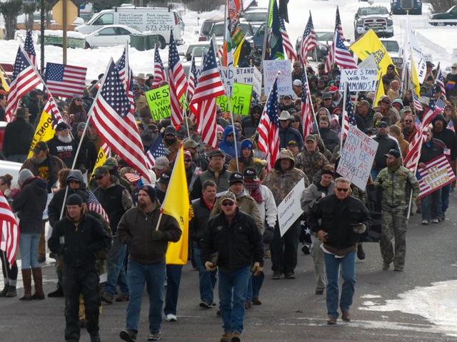 Protesters march on Court Avenue in support of an Oregon ranching family facing jail time for arson in Burns, Oregon. (AP Photo) Protesters march on Court Avenue in support of an Oregon ranching family facing jail time for arson in Burns, Oregon. (AP Photo)