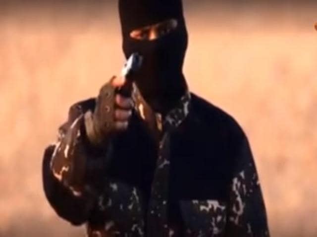 A video that surfaced on Sunday night shows a man dubbed as the “New Jihadi John” who holds a gun and mocks British PM Cameron for daring to “challenge the might” of the extremist group. (YouTube screengrab) A video that surfaced on Sunday night shows a man dubbed as the “New Jihadi John” who holds a gun and mocks British PM Cameron for daring to “challenge the might” of the extremist group. (YouTube screengrab)