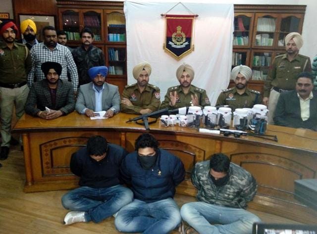 The crime investigation agency (CIA) wing of SAS Nagar police have arrested three men with weapons smuggled from Pakistan along with a Pakistani SIM card. (HT Photo) The crime investigation agency (CIA) wing of SAS Nagar police have arrested three men with weapons smuggled from Pakistan along with a Pakistani SIM card. (HT Photo)